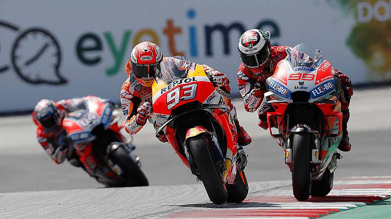 Marc Márquez y Jorge Pedrosa codo a codo en una carrera